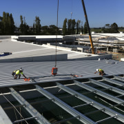 The Silverdale Centre roof was installed by Kiwi construction, roof, structure, black, gray