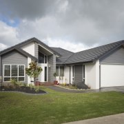 Generation Homes house with joinery by Elite - cottage, elevation, estate, facade, home, house, property, real estate, residential area, roof, siding, suburb, window, yard, gray