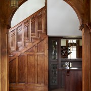 Fine craftsmanship is a hallmark of the Arts arch, door, hardwood, wall, window, wood, wood stain, brown, red