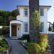 Renovated Omana Lodge by Constable Hurst Architects building, cottage, estate, facade, home, house, landscaping, property, real estate, residential area, sky, villa, window