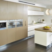 Designer Carolyn Cavanough of Desire Beauty specified a cabinetry, countertop, cuisine classique, home appliance, interior design, kitchen, product design, gray, white