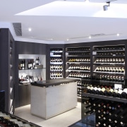 The counter in the Boreaux etc wine store electronics, liquor store, product, retail, white, black