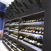 At the etc wine stores in Hong Kong, product, shoe store, wine rack, black, white