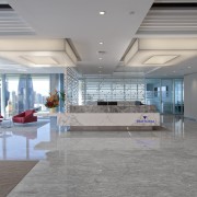 Designphase DBA evoked the standing of Trafigura through ceiling, daylighting, floor, flooring, interior design, lobby, gray