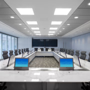The boardroom of the Trafigura office is fitted ceiling, conference hall, interior design, office, gray, white