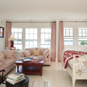 The red and white theme in this bedroom bedroom, ceiling, floor, furniture, home, interior design, living room, real estate, room, window, window covering, window treatment, gray