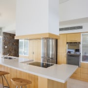 Raw concrete and light wood kitchen - Raw architecture, countertop, cuisine classique, home, house, interior design, interior designer, kitchen, real estate, gray, white