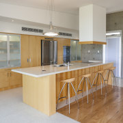 Raw concrete and light wood kitchen - Raw cabinetry, countertop, cuisine classique, floor, flooring, hardwood, interior design, kitchen, real estate, room, wood flooring, gray