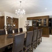 Solid wood furniture and studded leather chairs bring ceiling, dining room, estate, interior design, property, real estate, room, table, gray