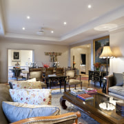 This apartment has been transformed into a refined ceiling, estate, home, interior design, living room, property, real estate, room, gray