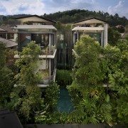 Sustainable design by GSD Architect Almost hidden from architecture, estate, garden, home, house, plant, property, real estate, reflection, residential area, sky, tree, vegetation, water, brown