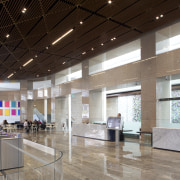 The curved, granite-clad form of the existing tower ceiling, exhibition, interior design, lobby, gray