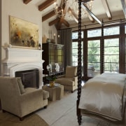 The master bedroom in this Mediterranean Californian home ceiling, floor, home, interior design, living room, room, window, brown, gray