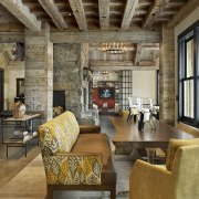 Rustic surfaces are underpinned with contemporary touches in beam, ceiling, interior design, living room, loft, wood, brown