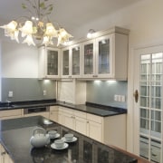 This Milvia Hannah kitchen melds with its surroundings. cabinetry, countertop, cuisine classique, home, interior design, kitchen, property, real estate, room, window, gray