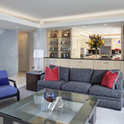 The living room cabinetry is a repeat of apartment, ceiling, home, interior design, living room, property, real estate, room, gray