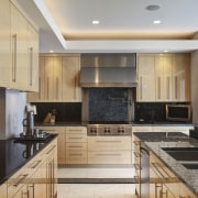 This kitchen designed by Mary Jane Pappas and cabinetry, countertop, cuisine classique, interior design, kitchen, living room, real estate, room, gray