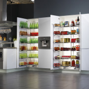 All the items stored in a Kessebohmer Tandem display case, product, refrigerator, shelf, shelving, gray, white, black