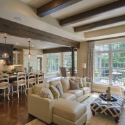 The family, dining and kitchen area is now ceiling, estate, home, interior design, living room, real estate, room, window, gray, brown