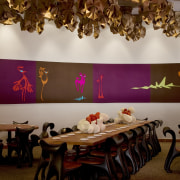 In the dining room of the Américas River interior design, restaurant, table, gray, brown, red