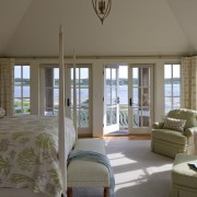 The master bedroom in this Cape Cod home ceiling, daylighting, estate, home, house, interior design, living room, real estate, room, window, window treatment, gray, brown