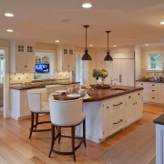 A traditional paneled kitchen was an appropriate inclusion cabinetry, countertop, cuisine classique, hardwood, home, interior design, kitchen, real estate, room, wood flooring, orange, brown, gray