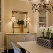 A steeply pitched gable roof and traditional detailing dining room, furniture, home, interior design, living room, room, table, wall, orange, brown