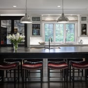 This Mick De Giulio  kitchen responds to cabinetry, countertop, cuisine classique, dining room, interior design, kitchen, room, gray, black