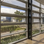 Express Aluminium Ltd designed, fabricated and delivered aluminium property, real estate, window, brown