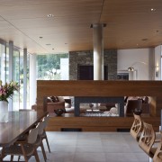 In this lakeside house, wood veneer ceilings run architecture, ceiling, dining room, house, interior design, living room, real estate, table, gray, brown