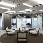 The ANZ Centre refurbishment was undertaken by Warren ceiling, floor, interior design, lobby, office, real estate, white, gray, black