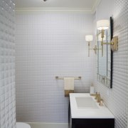 With its floor-to-ceiling glossy white mosaic tiles, this architecture, bathroom, ceiling, daylighting, floor, flooring, home, interior design, plumbing fixture, room, sink, tile, wall, gray