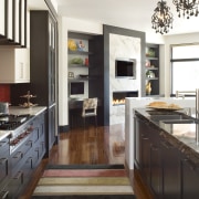Ebonized wood, back-painted glass and two-pack lacquer are cabinetry, countertop, cuisine classique, floor, interior design, kitchen, wood flooring, white, black