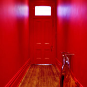 A lively palette of Resene colours has transformed floor, flooring, interior design, light, lighting, red, room, wood, red