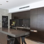 This Edwardian villa, built in the 1900s, retains architecture, countertop, floor, interior design, kitchen, real estate, gray, black