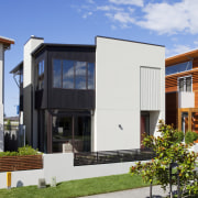 Wake-up call  Coast Papamoa beach development - architecture, building, cottage, elevation, facade, home, house, neighbourhood, property, real estate, residential area, window, white