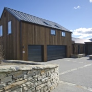 In character  Heritage Tray roofing - In barn, building, cottage, home, house, hut, property, real estate, shed, siding, wood, gray, black, teal