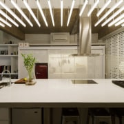 This kitchen stands at the centre of a ceiling, countertop, interior design, kitchen, white, brown