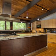The new cabinetry in the kitchen of this architecture, cabinetry, ceiling, countertop, estate, flooring, hardwood, interior design, kitchen, real estate, wood, brown