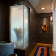 This hallway features walnut paneling. The corner window architecture, bathroom, ceiling, interior design, room, black, brown