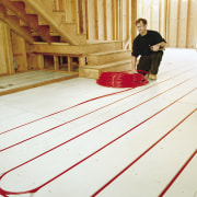 This home looks the part in a winter design, floor, flooring, furniture, girl, hardwood, indoor games and sports, line, red, structure, table, wood, white