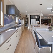 Innovative storage and ample bench space ensure this countertop, house, interior design, kitchen, real estate, gray