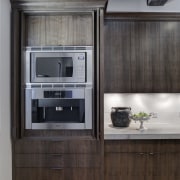 In this kitchen remodel by Doug Durbin, the cabinetry, countertop, cuisine classique, home appliance, interior design, kitchen, kitchen appliance, major appliance, refrigerator, black, gray