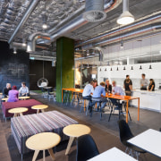 A multifaceted facade behind the reception desk of interior design, gray, white