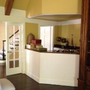 Urban edge  redecoration by Buckingham Interiors - cabinetry, ceiling, countertop, door, floor, flooring, furniture, hardwood, home, house, interior design, kitchen, property, room, wall, window, wood, wood flooring, orange, brown