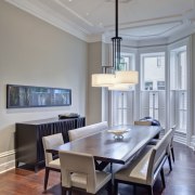 Crisp simplicity defines this contemporary kitchen in an ceiling, dining room, floor, furniture, hardwood, home, interior design, living room, room, table, wood flooring, gray