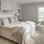 Master bedroom in Amish style new home - bed, bed frame, bedroom, floor, home, interior design, property, real estate, room, wall, window, wood, gray