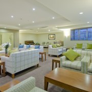 Bupa Parklands on Papanui Village features a wide ceiling, estate, home, interior design, living room, real estate, room, suite, gray