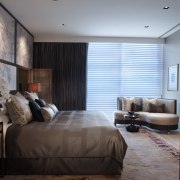 This master bedroom features a sensuous curved sofa. bedroom, ceiling, home, interior design, living room, room, suite, wall, window, window covering, window treatment, wood, black, gray