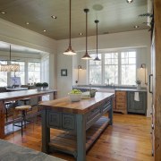 This new house looks old  as if cabinetry, ceiling, countertop, floor, flooring, hardwood, interior design, kitchen, room, table, wood, wood flooring, gray, brown